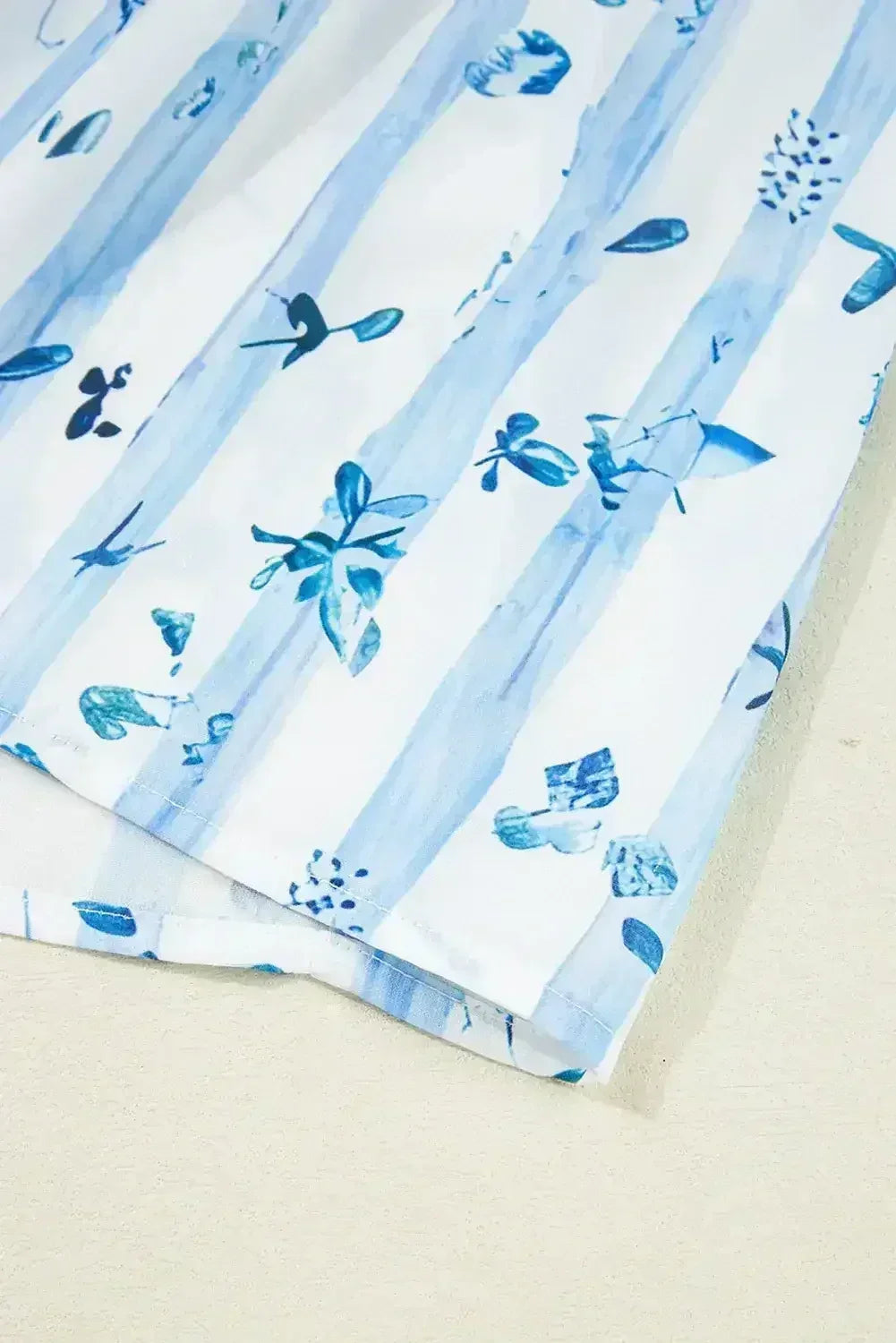 Sky Blue Floral Smocked A-Line Tie Straps Maxi Dress