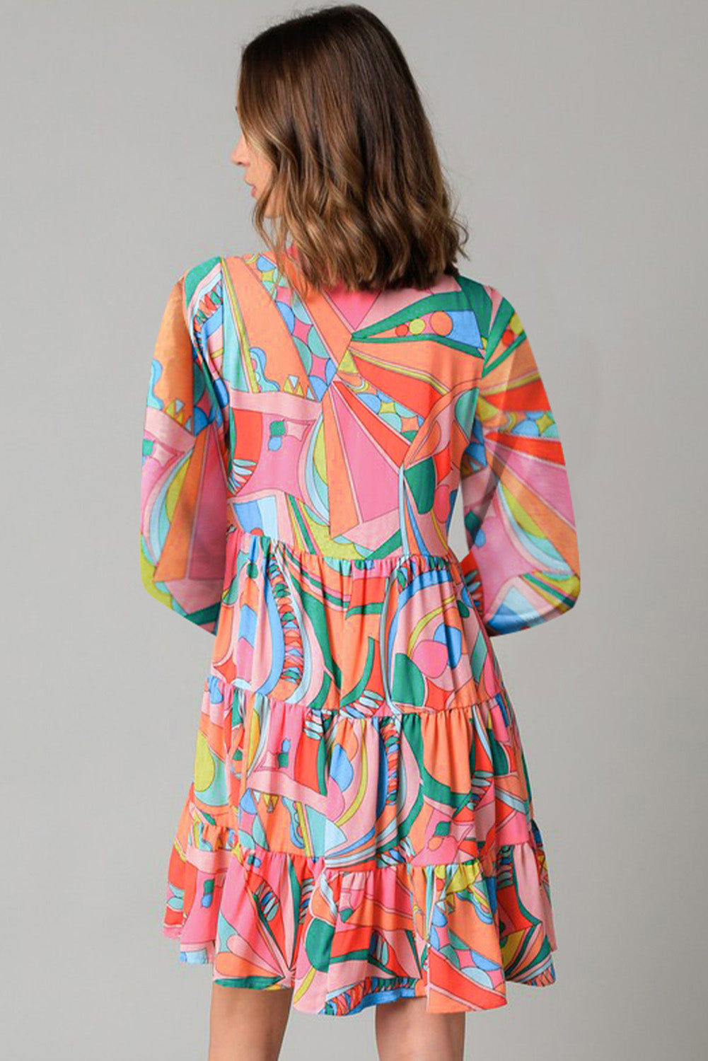 Multicolored Printed Long Sleeve Tie Neck Mini Dress Playful Statement Piece Charming Colored Dress