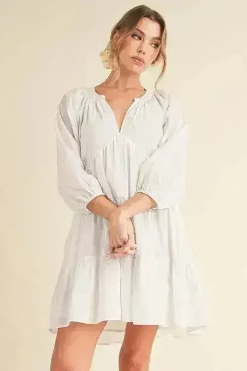 Aemi + Co Notched Balloon Sleeve Tiered Mini Dress