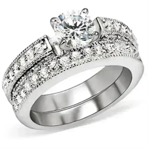 5X016 Rhodium Brass Ring – 6.5mm AAA Clear CZ Solitaire (Bold & Brilliant)