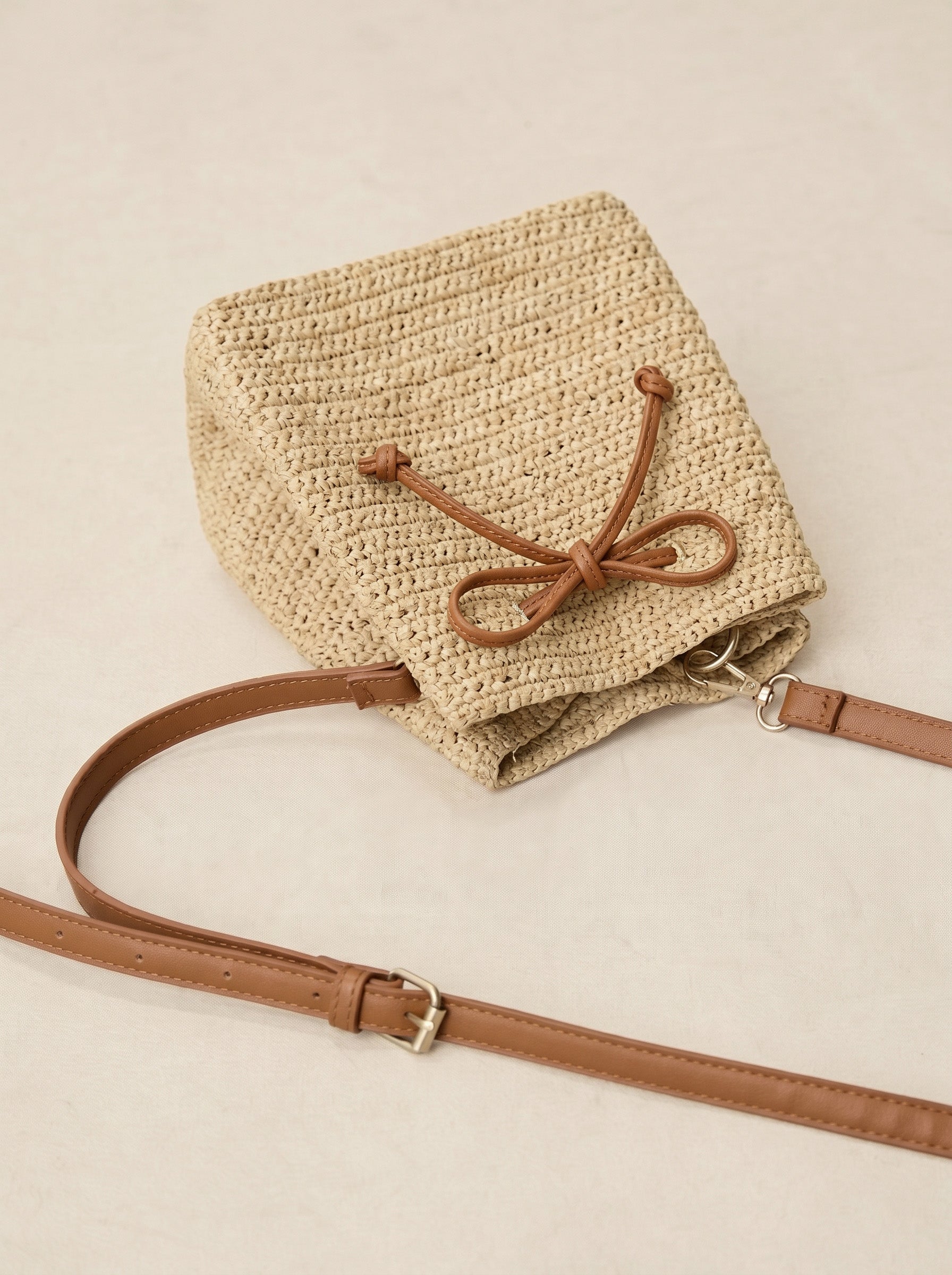 Mini Handwoven Raffia Drawstring Crossbody Bag