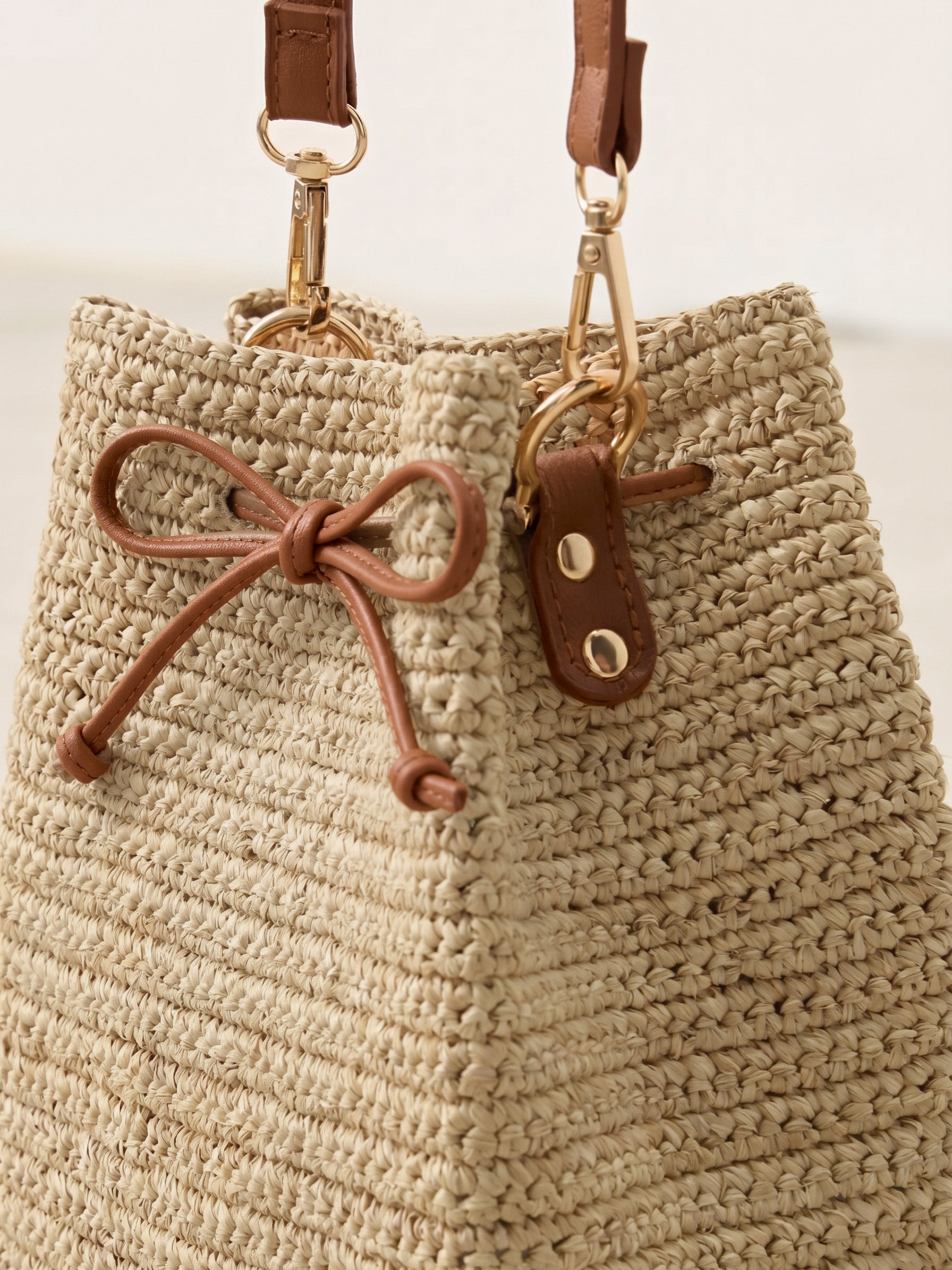 Mini Handwoven Raffia Drawstring Crossbody Bag