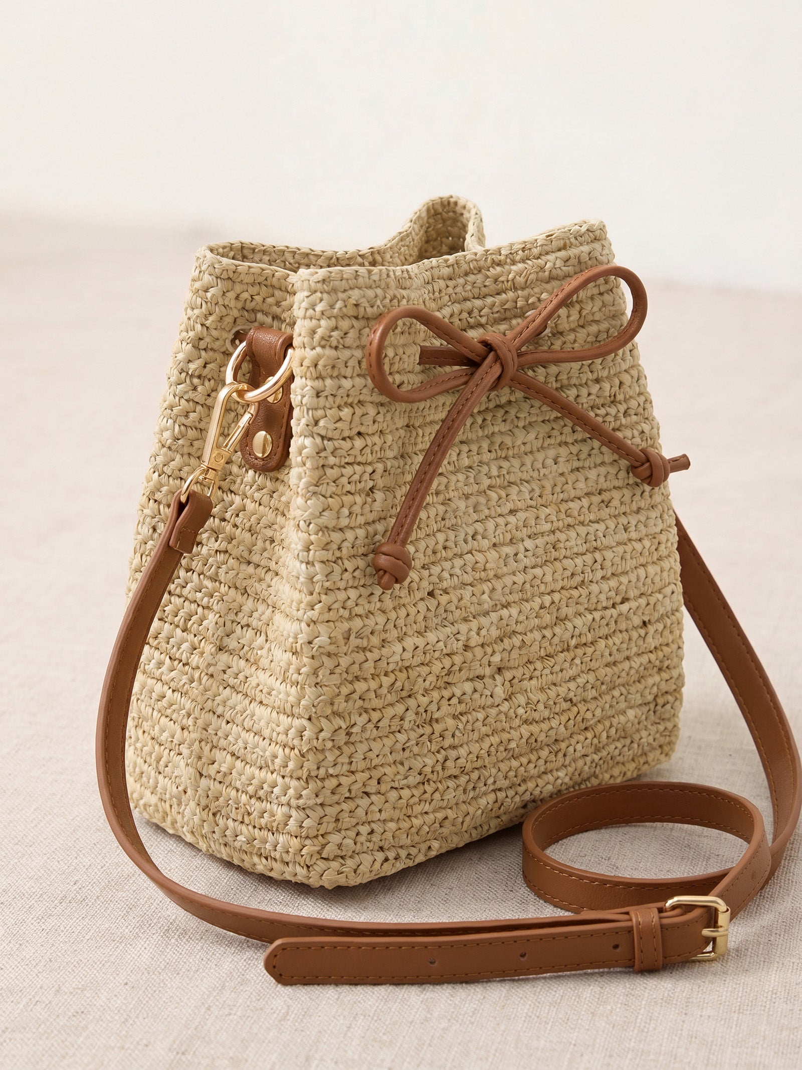 Mini Handwoven Raffia Drawstring Crossbody Bag