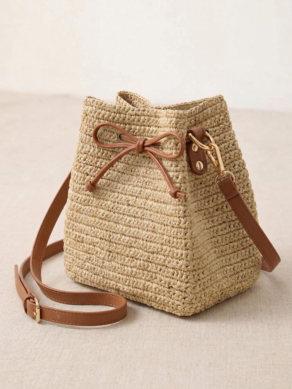 Mini Handwoven Raffia Drawstring Crossbody Bag