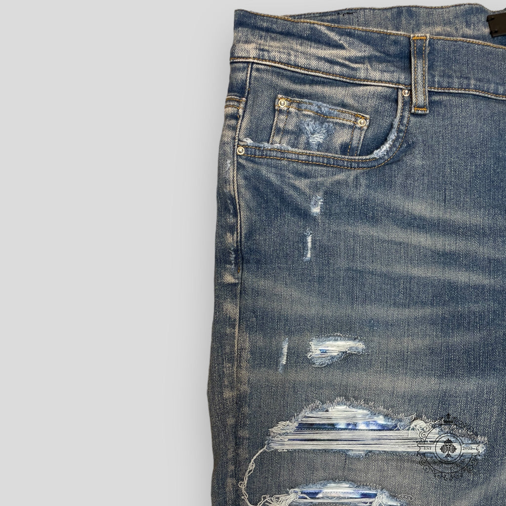 Amiri Tie Dye Bandana Thrasher Jeans in Clay Indigo