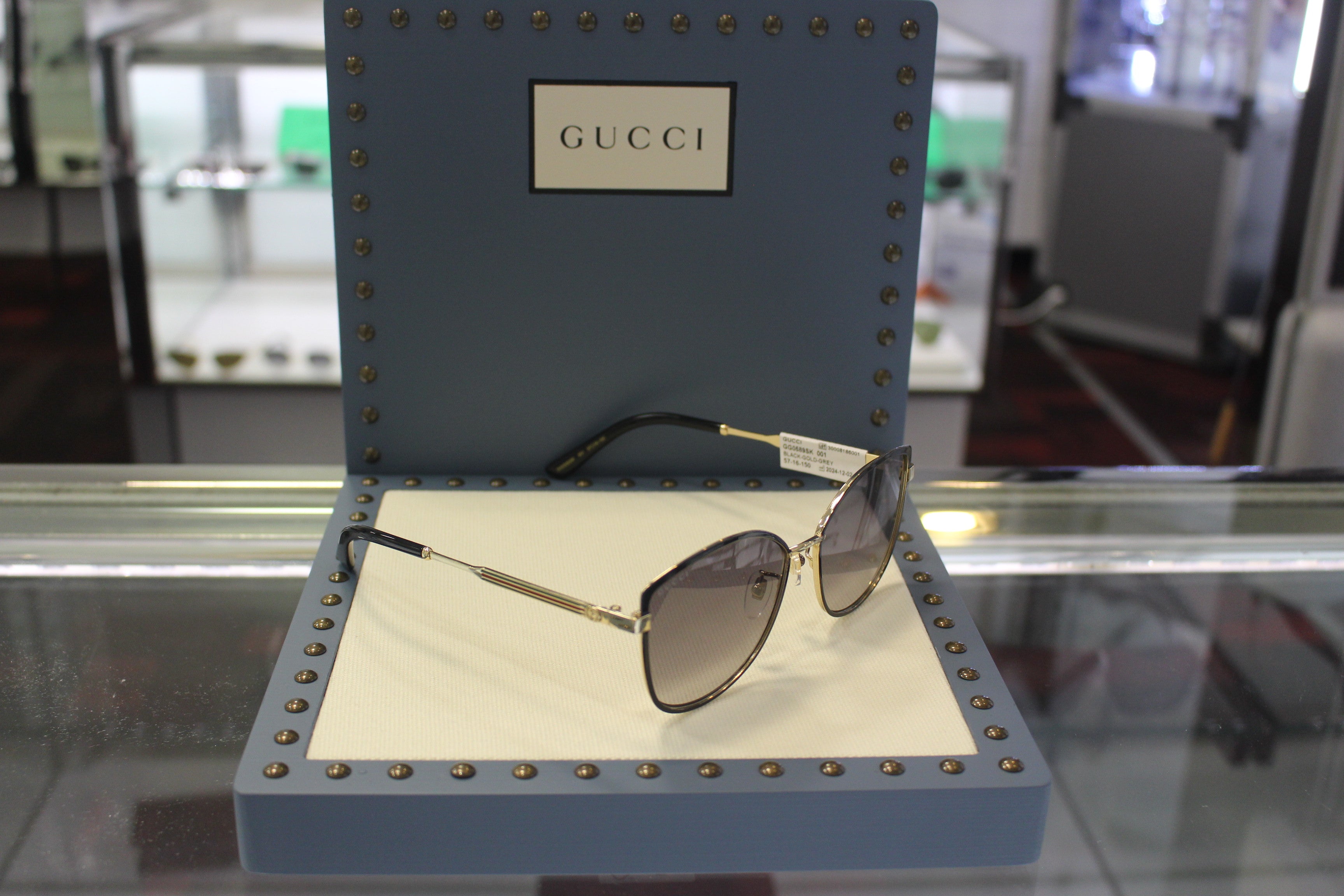 Gucci GG0589SK-001 57 Women’s Sunglasses | Black/Gold Metal Frame | Authentic Luxury