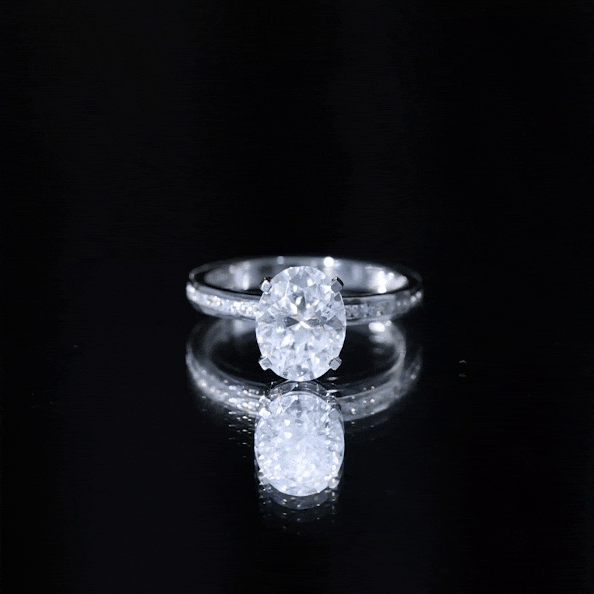 2 Carat Solitaire Moissanite Oval Engagement Ring with Channel Set Side Stones