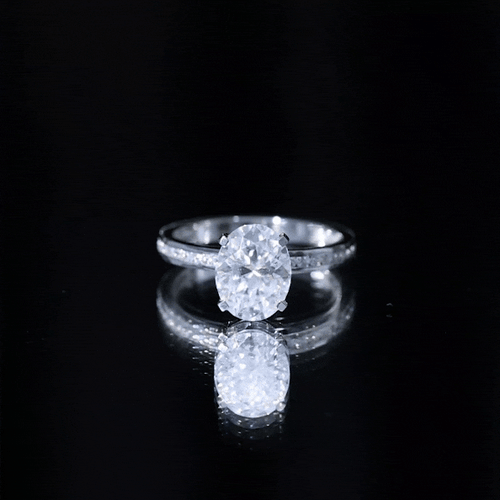 2 Carat Solitaire Moissanite Oval Engagement Ring with Channel Set Side Stones