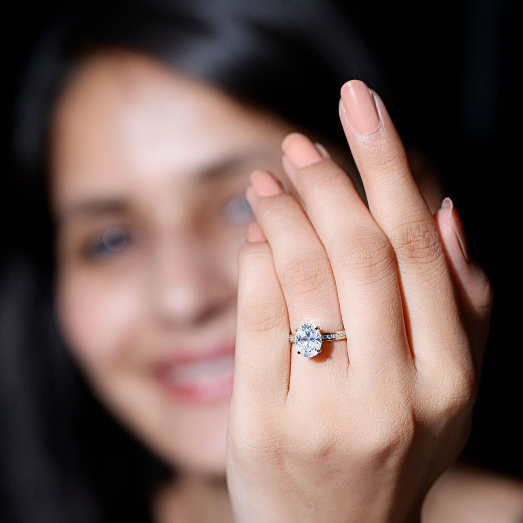 2 Carat Solitaire Moissanite Oval Engagement Ring with Channel Set Side Stones