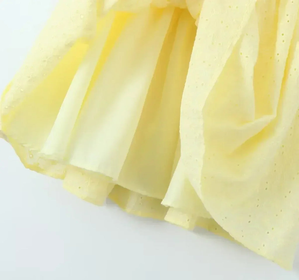 YENKYE Sexy Elegant Women Hollow Out Embroidery Yellow Sling Mini Dress Low Waist Lace Up Bandage Party Dresses Birthday Robe