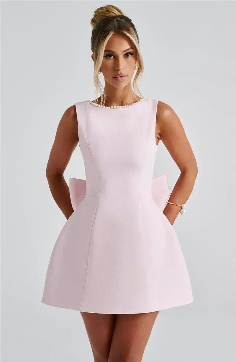 Mozision Pearl Bow Backless Sexy Mini Dress For Women Robe Fashion Zipper Sleeveless High Waist A-line Club Party Dress Elegant