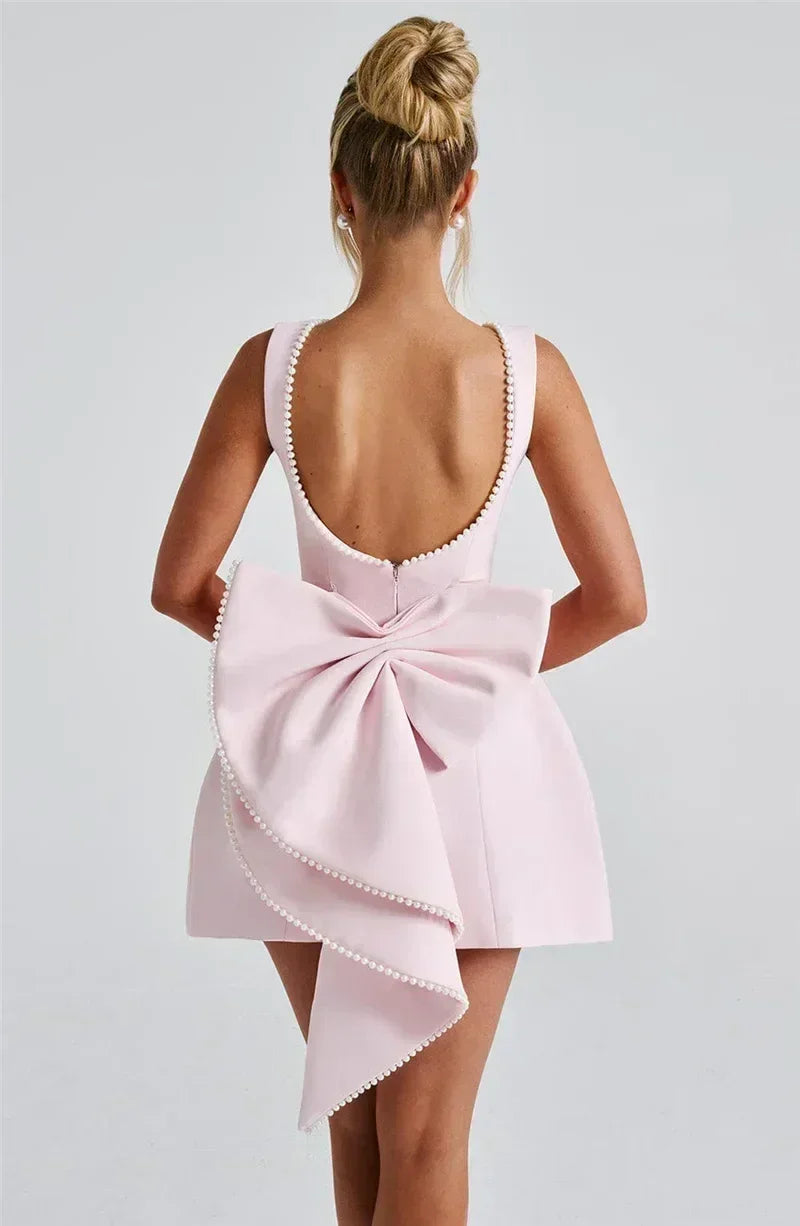 Mozision Pearl Bow Backless Sexy Mini Dress For Women Robe Fashion Zipper Sleeveless High Waist A-line Club Party Dress Elegant
