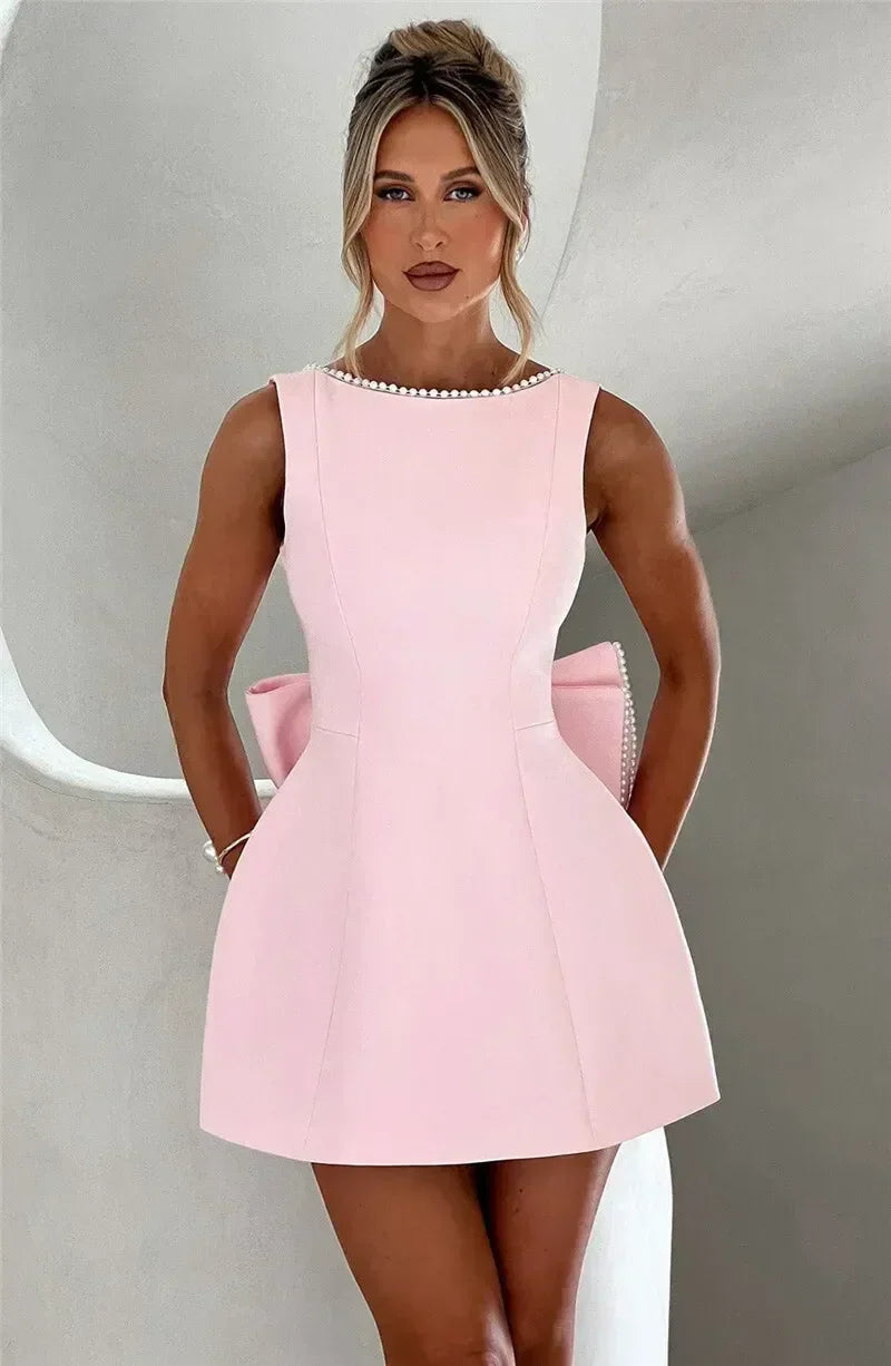 Mozision Pearl Bow Backless Sexy Mini Dress For Women Robe Fashion Zipper Sleeveless High Waist A-line Club Party Dress Elegant