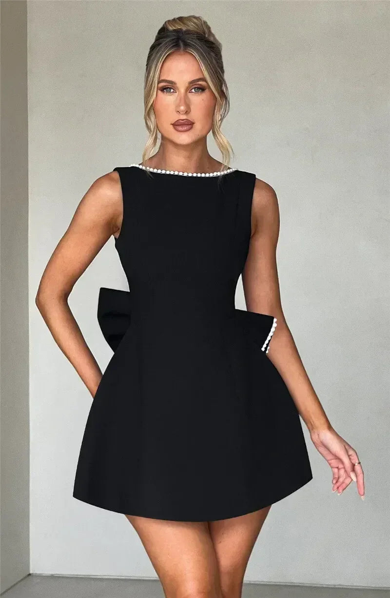 Mozision Pearl Bow Backless Sexy Mini Dress For Women Robe Fashion Zipper Sleeveless High Waist A-line Club Party Dress Elegant