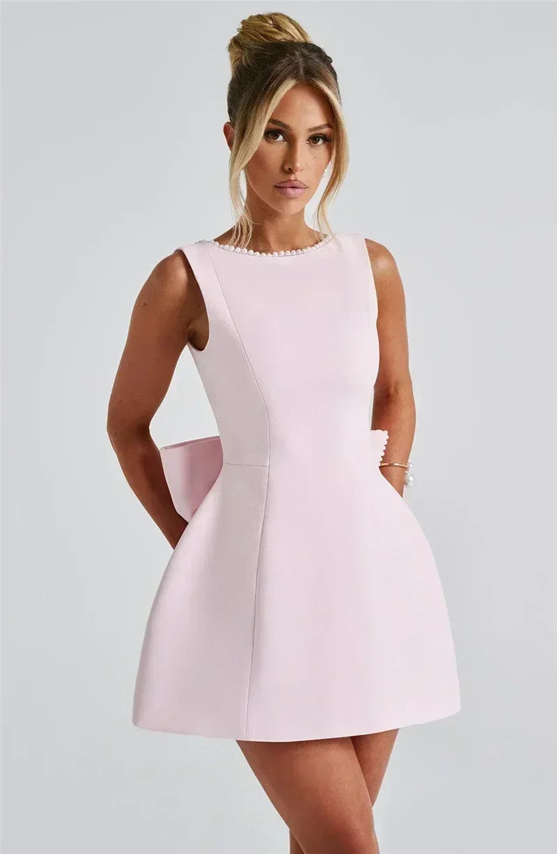 Mozision Pearl Bow Backless Sexy Mini Dress For Women Robe Fashion Zipper Sleeveless High Waist A-line Club Party Dress Elegant