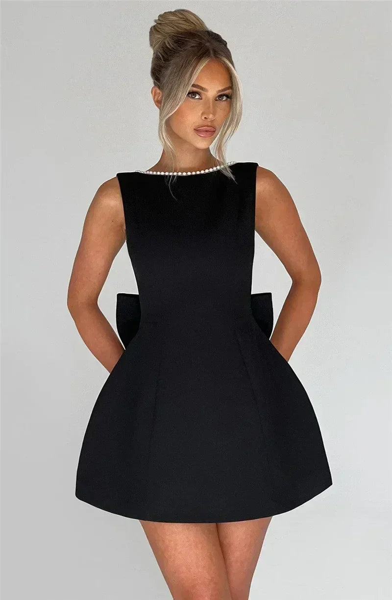 Mozision Pearl Bow Backless Sexy Mini Dress For Women Robe Fashion Zipper Sleeveless High Waist A-line Club Party Dress Elegant