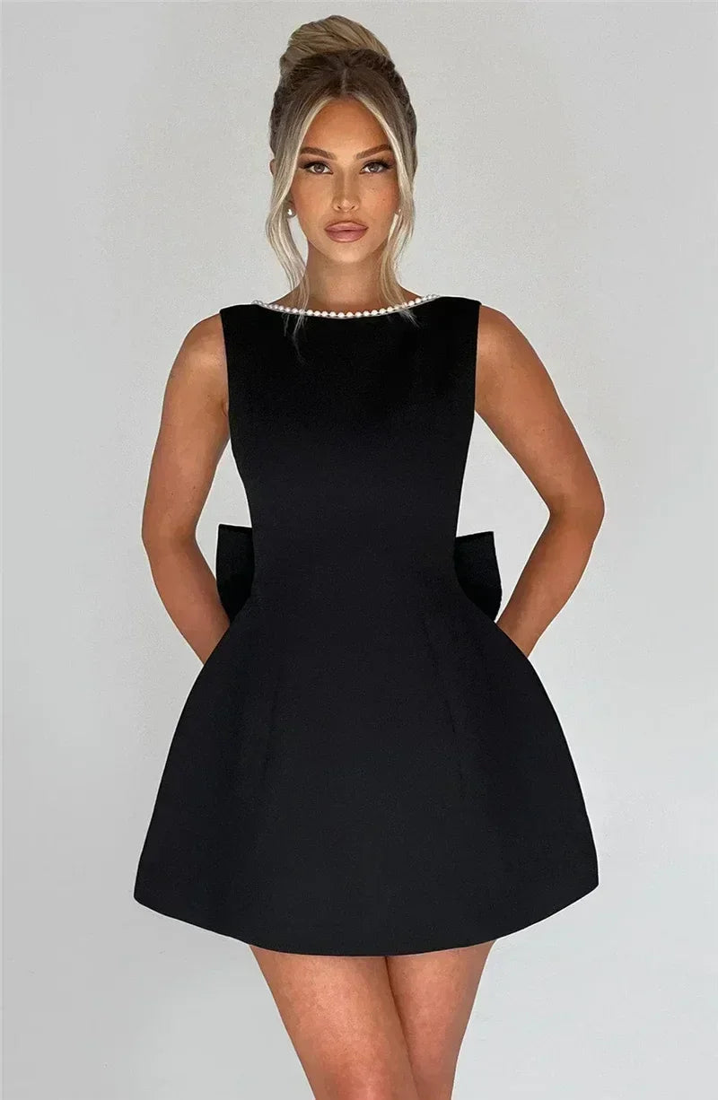 Mozision Pearl Bow Backless Sexy Mini Dress For Women Robe Fashion Zipper Sleeveless High Waist A-line Club Party Dress Elegant
