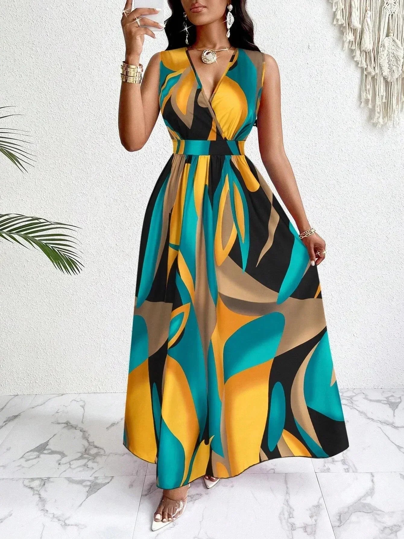 Women's sleeveless V-neck floor-length dress with abstract prints - fashionable for beach and casual occasions