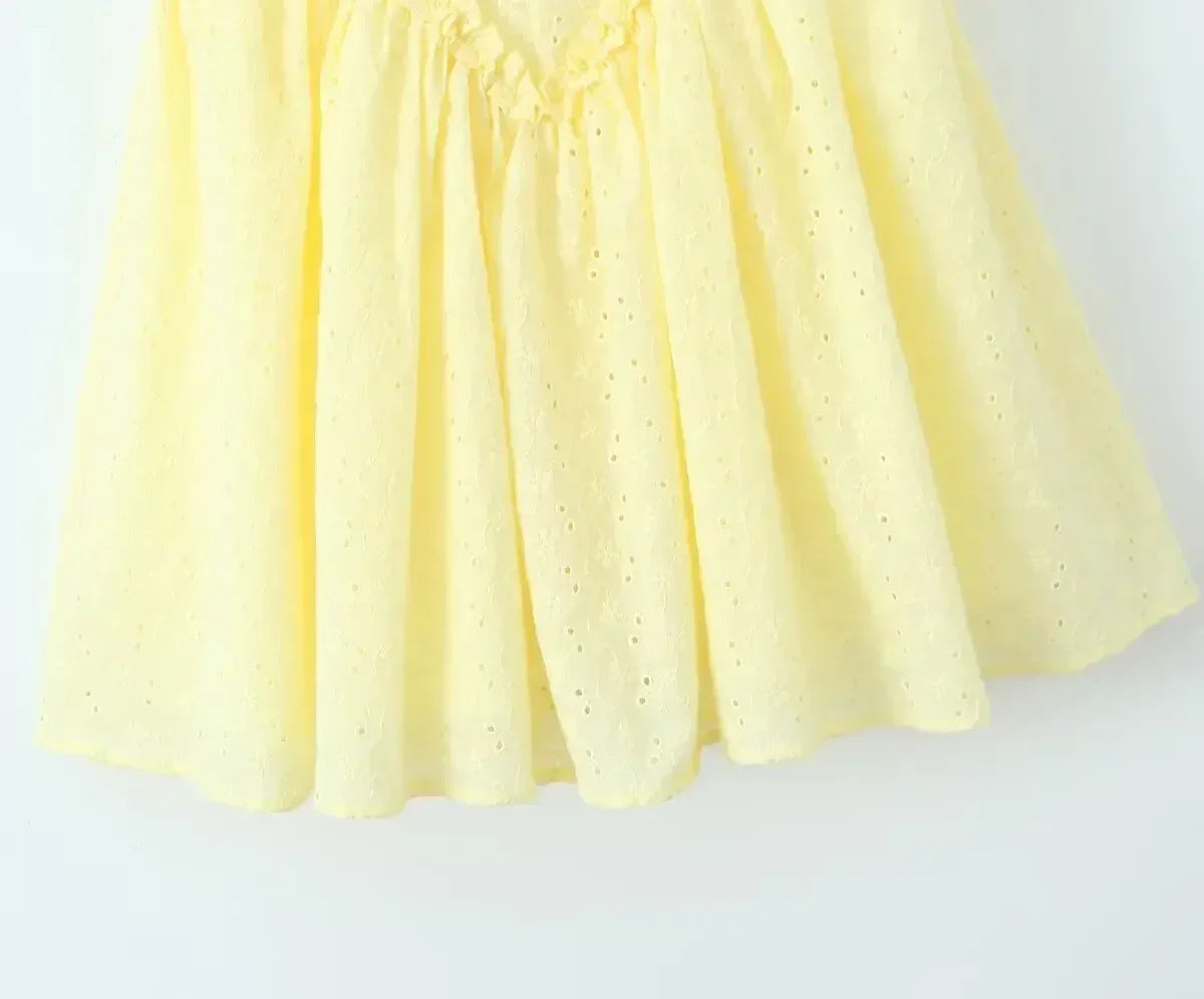 YENKYE Sexy Elegant Women Hollow Out Embroidery Yellow Sling Mini Dress Low Waist Lace Up Bandage Party Dresses Birthday Robe