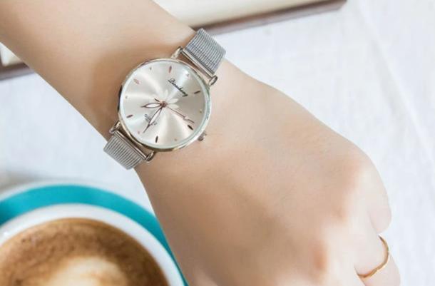 Women's Stylish Elegant Watch With Braided Steel Bracelet With Shiny Background Unique Design Perfect Gif